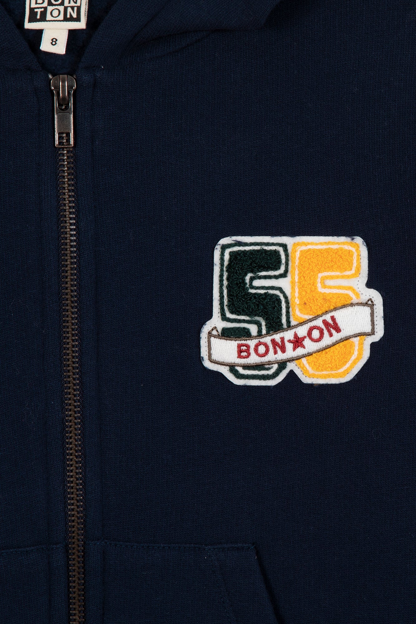 Gilet - capuche badge