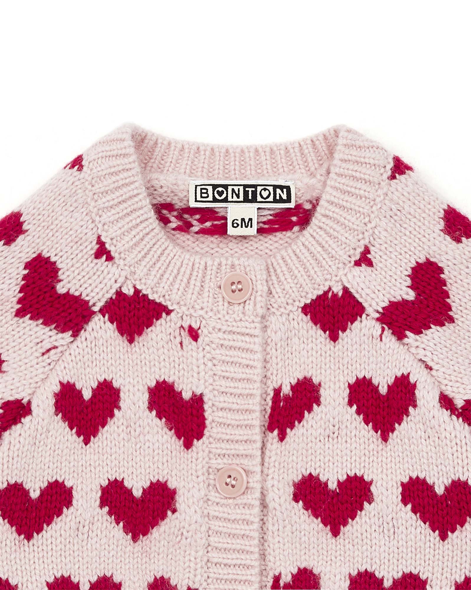 Gilet bébé jacquard coeurs rose