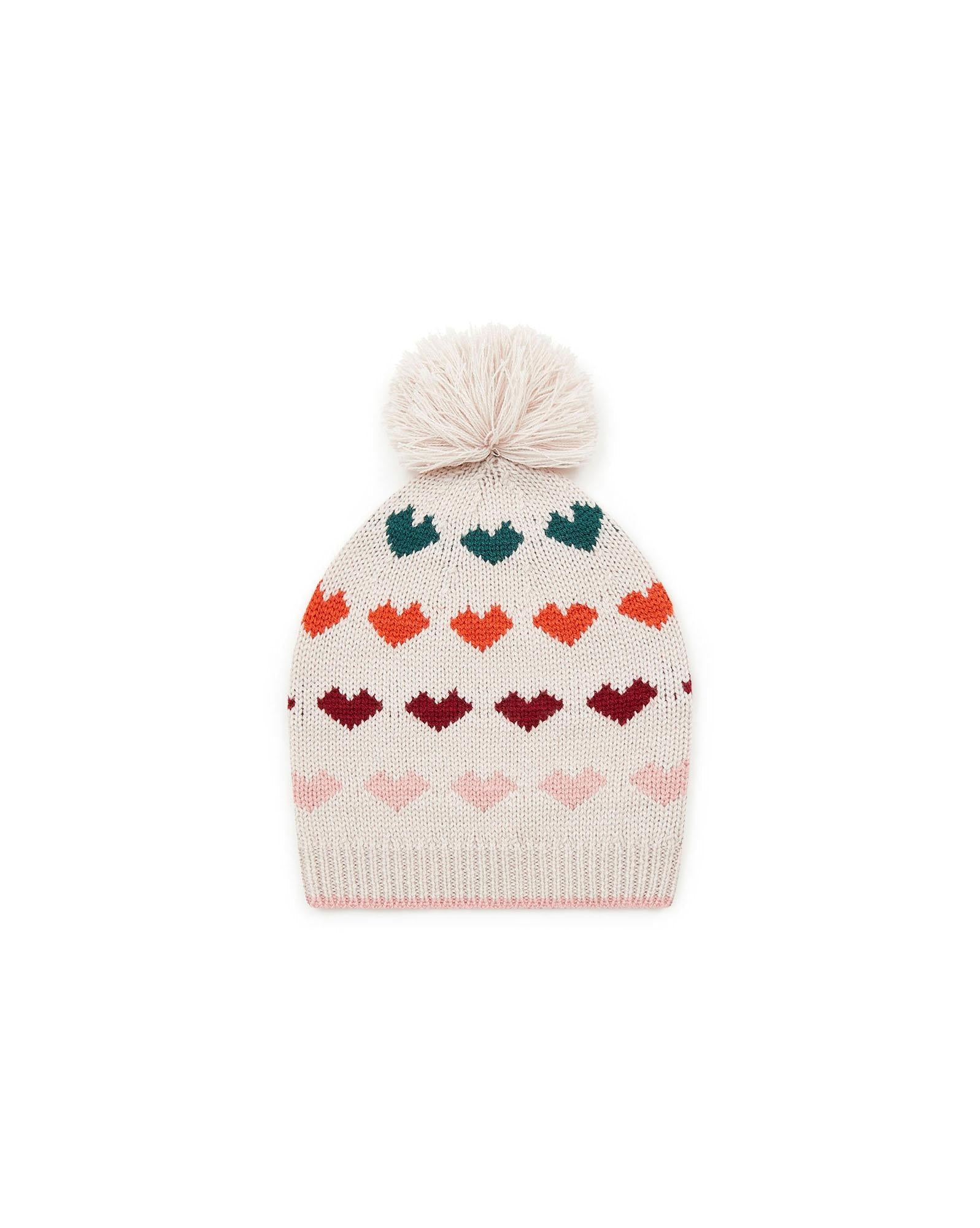 Bonnet à pompon beige en tricot jacquard