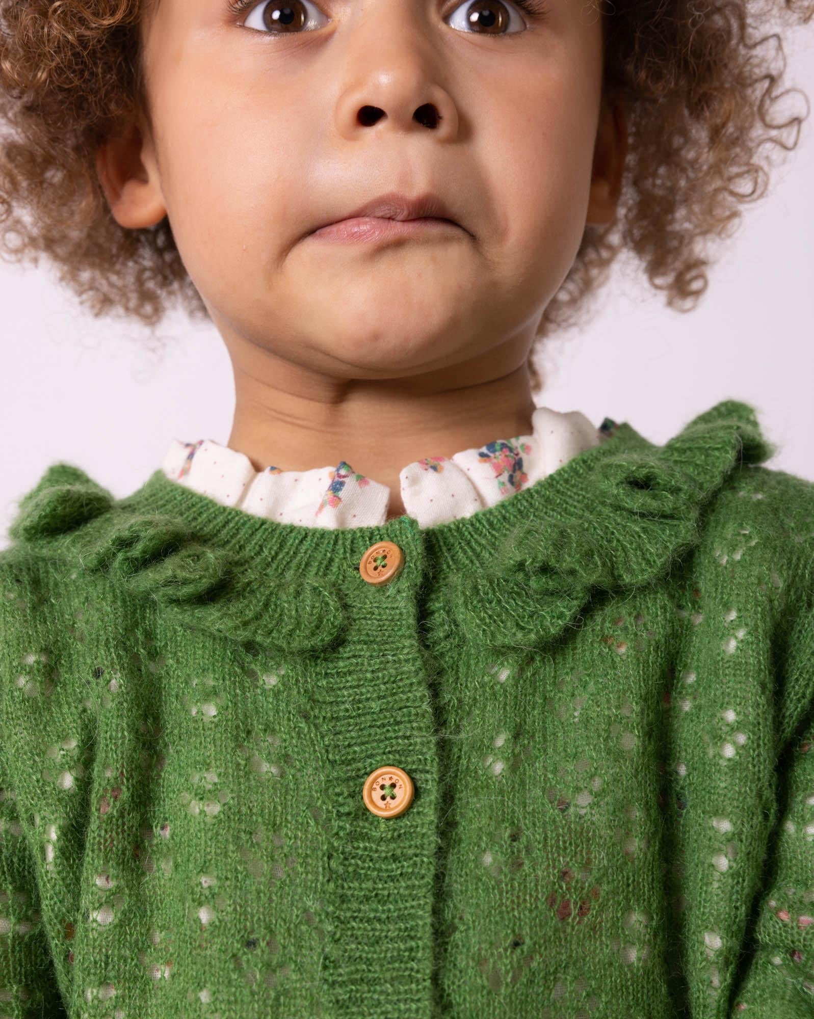 Cardigan Corolle vert en tricot ajouré